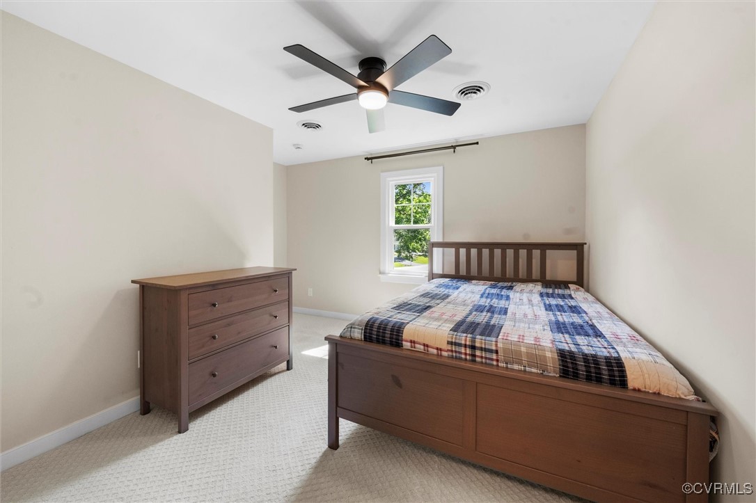 2430 Olde Stone Road Midlothian, VA 23113 - Photo 32 of 46 a bedroom with a bed and window
