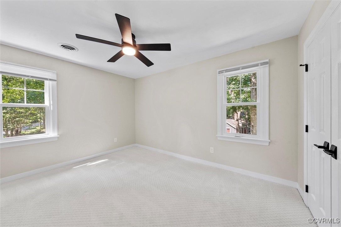 2430 Olde Stone Road Midlothian, VA 23113 - Photo 35 of 46 an empty room with windows