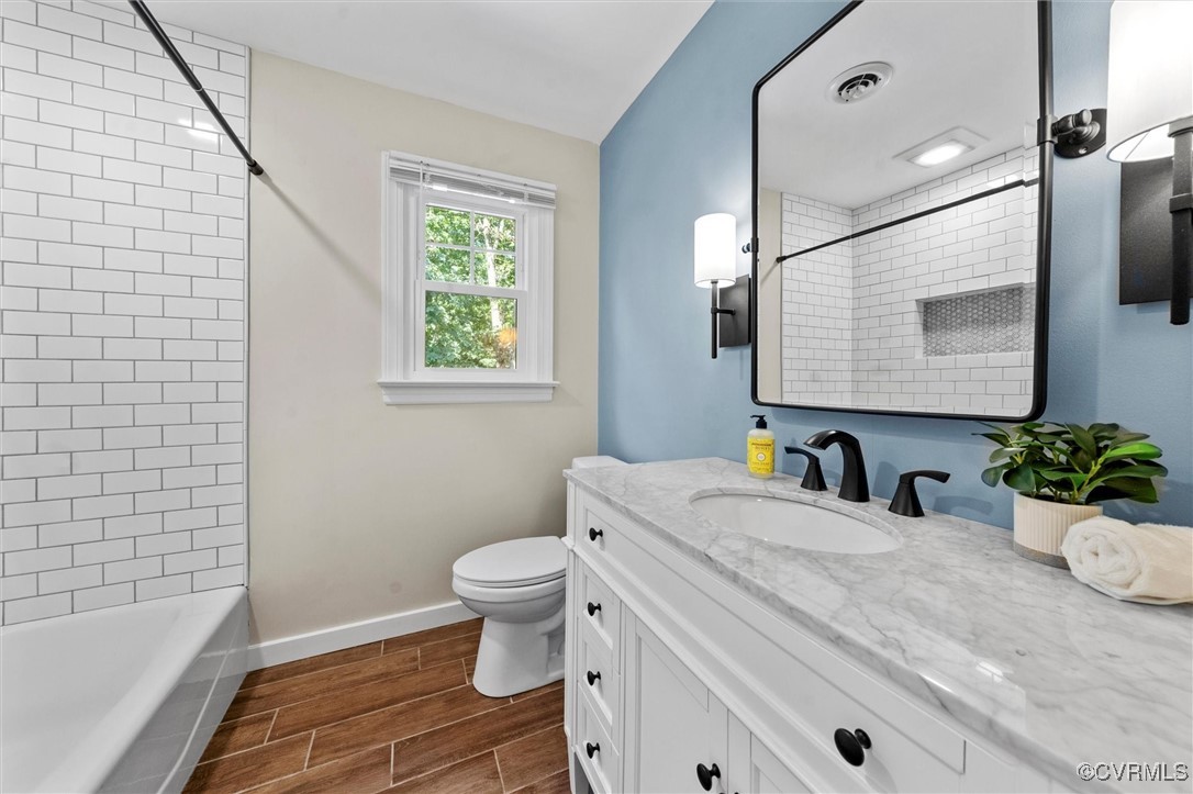 2430 Olde Stone Road Midlothian, VA 23113 - Photo 37 of 46 a bathroom with a sink toilet and shower