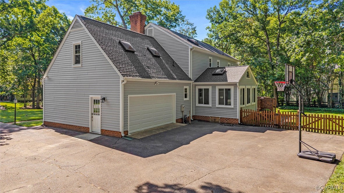 2430 Olde Stone Road Midlothian, VA 23113 - Photo 42 of 46 a view of a house with a backyard and a patio