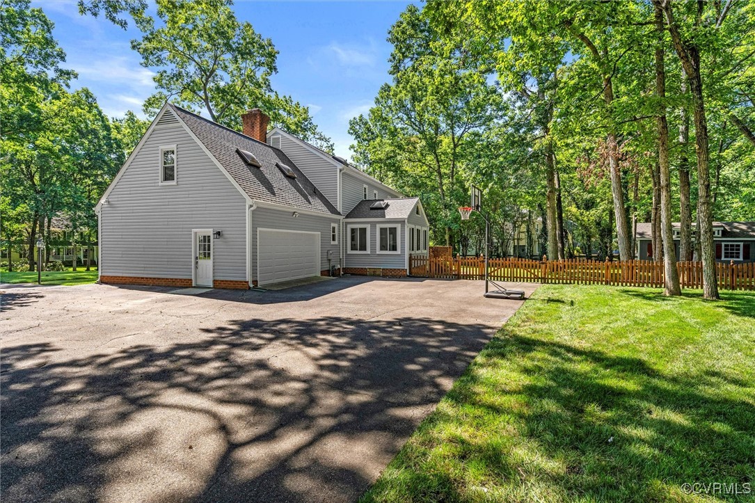 2430 Olde Stone Road Midlothian, VA 23113 - Photo 5 of 46 a house with tree in front of it