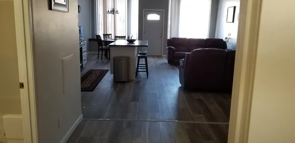 a view of kitchen and dining room with windows
