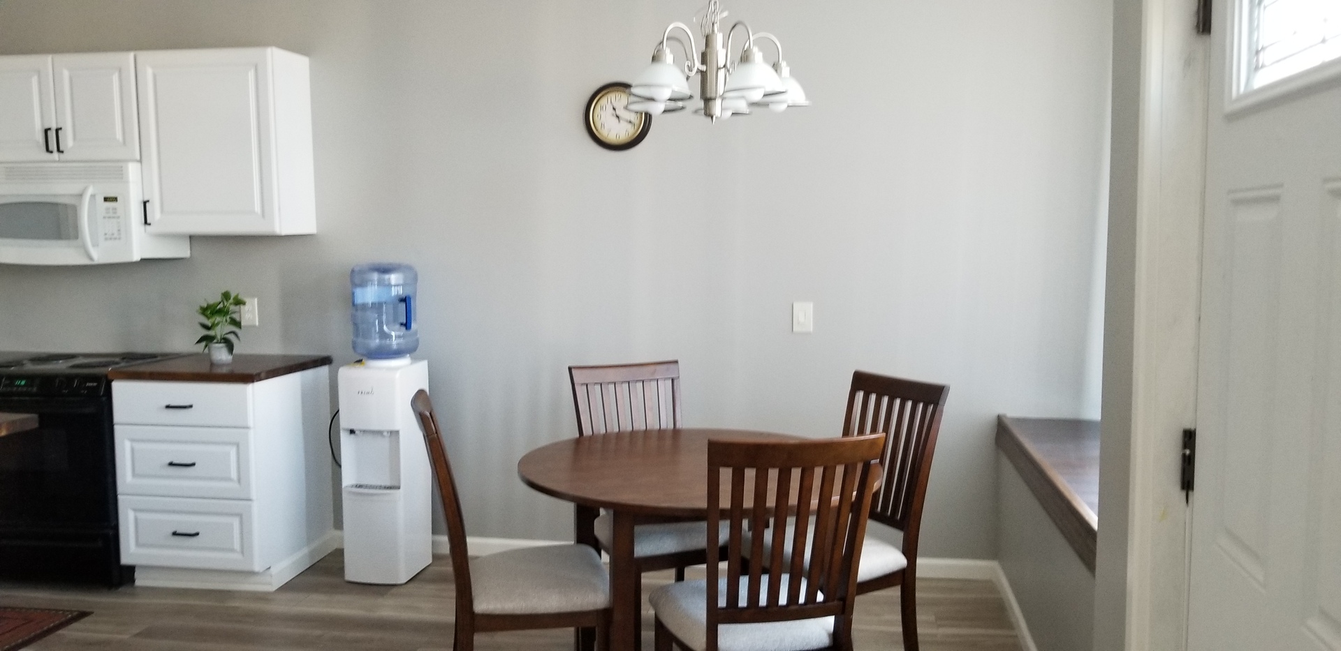 1402 5th Street, Unit 1402 LaSalle, IL 61301 - Photo 16 of 17 a view of a dining room with furniture and wooden floor