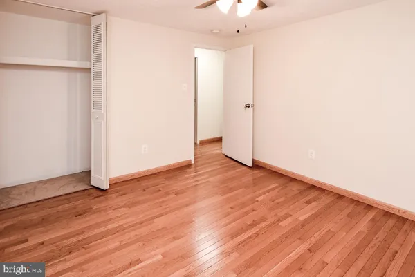 a bathroom with a shower and a toilet