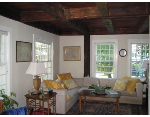184 Chestnut Plain Road Whately, MA 01093 - Photo 10 of 19 a living room with furniture and a large window