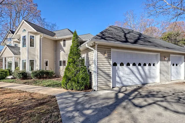 a view of a living room and a balcony