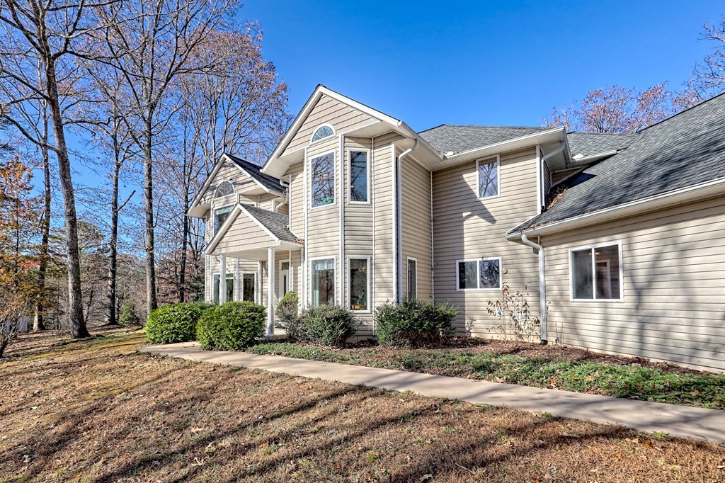 838 Peachtree Hills Road Murphy, NC 28906 - Photo 15 of 92 a front view of a house with a yard
