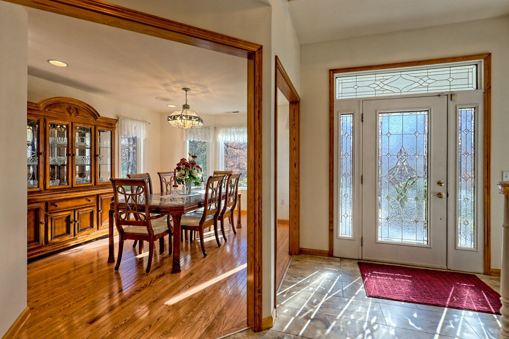 838 Peachtree Hills Road Murphy, NC 28906 - Photo 35 of 92 a view of a dining room with furniture window and wooden floor