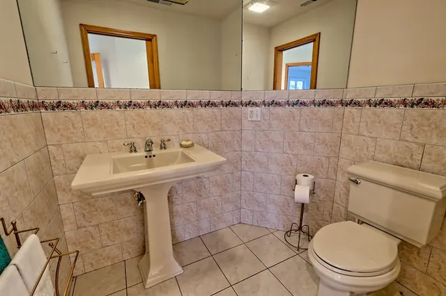 a bathroom with a tub and a shower