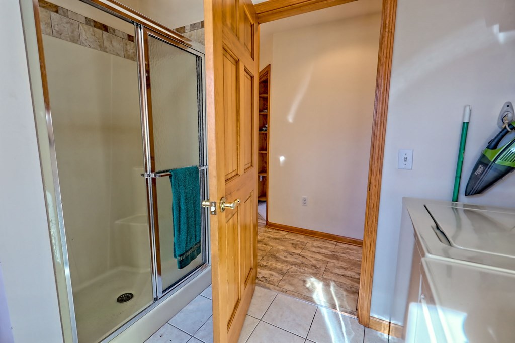 838 Peachtree Hills Road Murphy, NC 28906 - Photo 46 of 92 a bathroom with a shower and a glass door