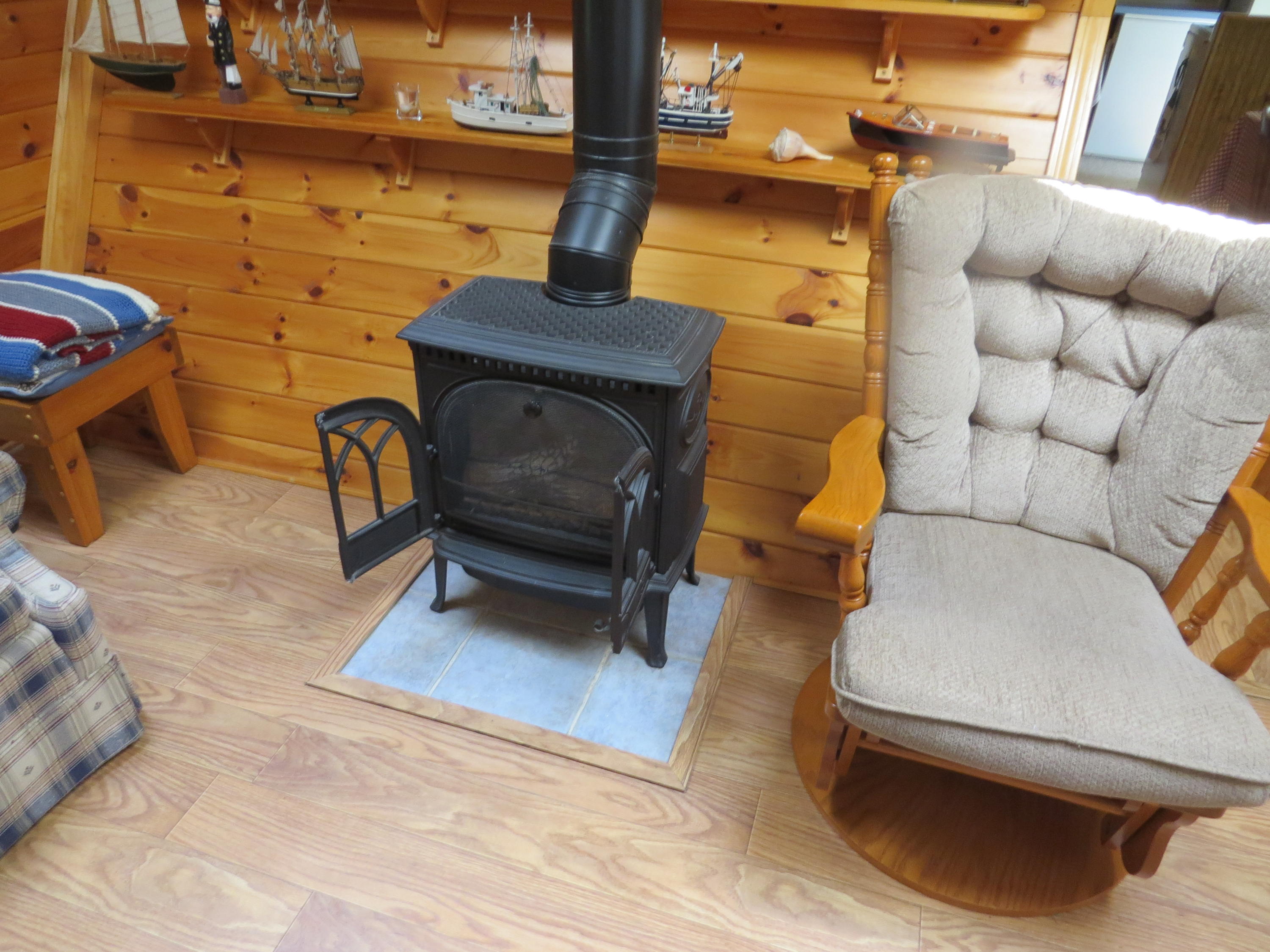 238 Wildwood Estates Rome, ME 04963 - Photo 20 of 41 Propane stove in living room.