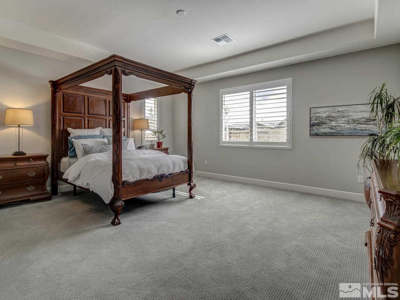 2169 Gazala Lane Reno, NV 89521 - Photo 13 of 25 a bedroom with a bed and a window