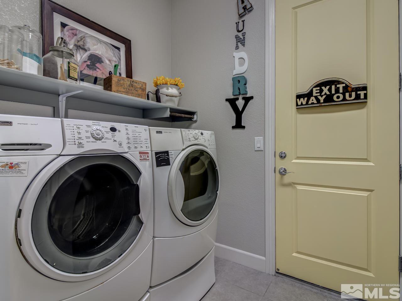 2169 Gazala Lane Reno, NV 89521 - Photo 17 of 25 a view of a hallway with washer and dryer