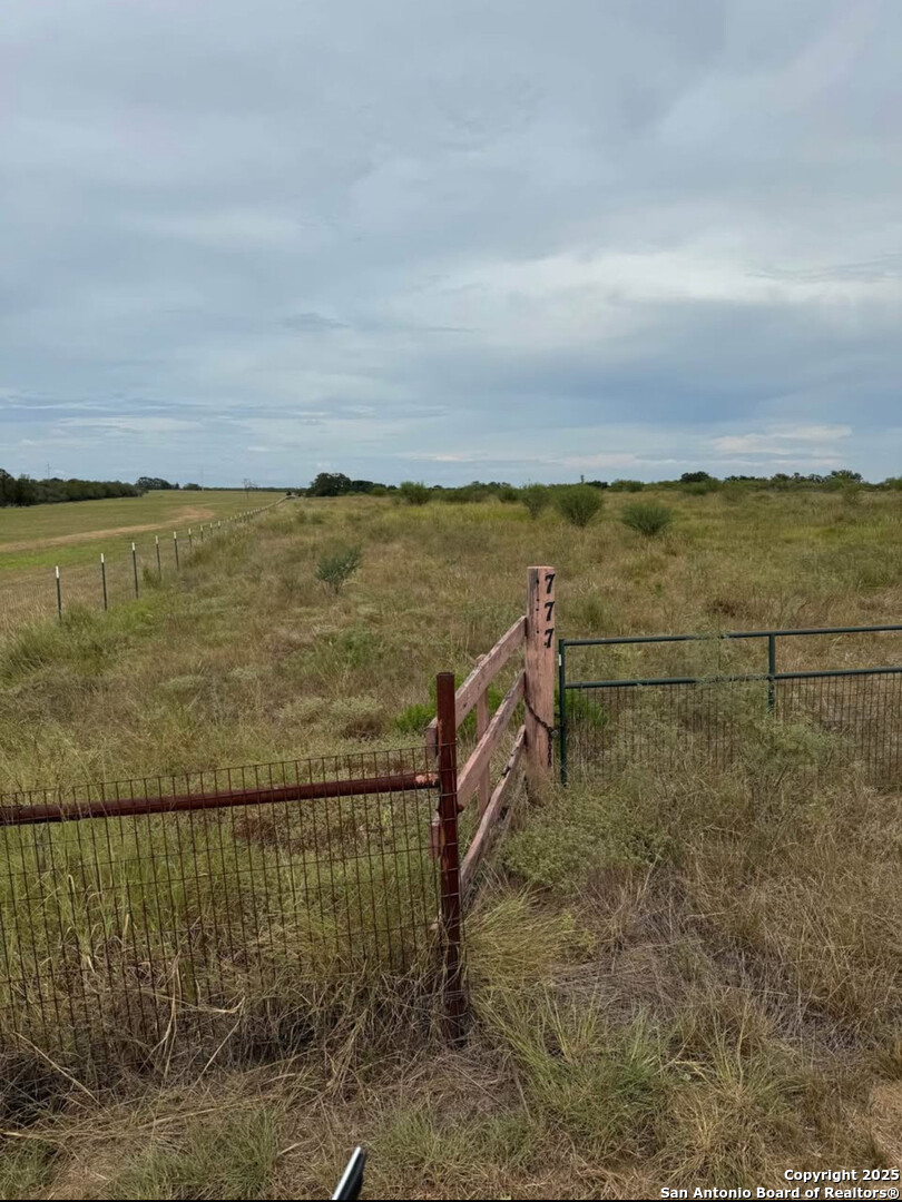 777 Woodrow Center Road Kingsbury, TX 78638 - Photo 5 of 8 a view of a lake with a mountain view