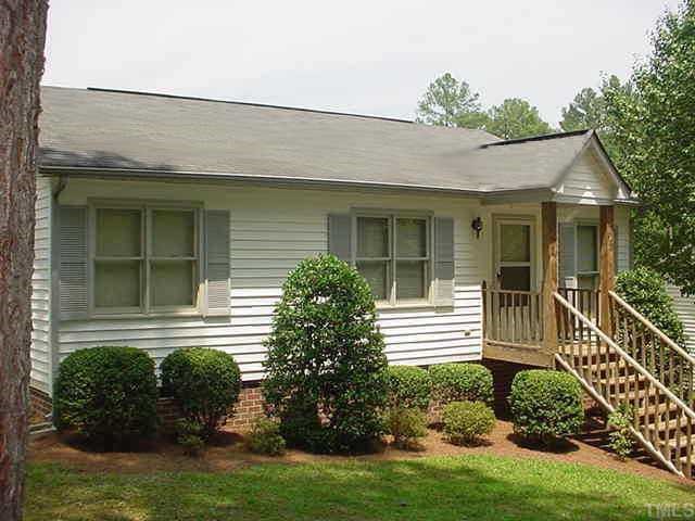 2721 Milburnie Road Raleigh, NC 27610 - Photo 1 of 1 a front view of a house with a yard