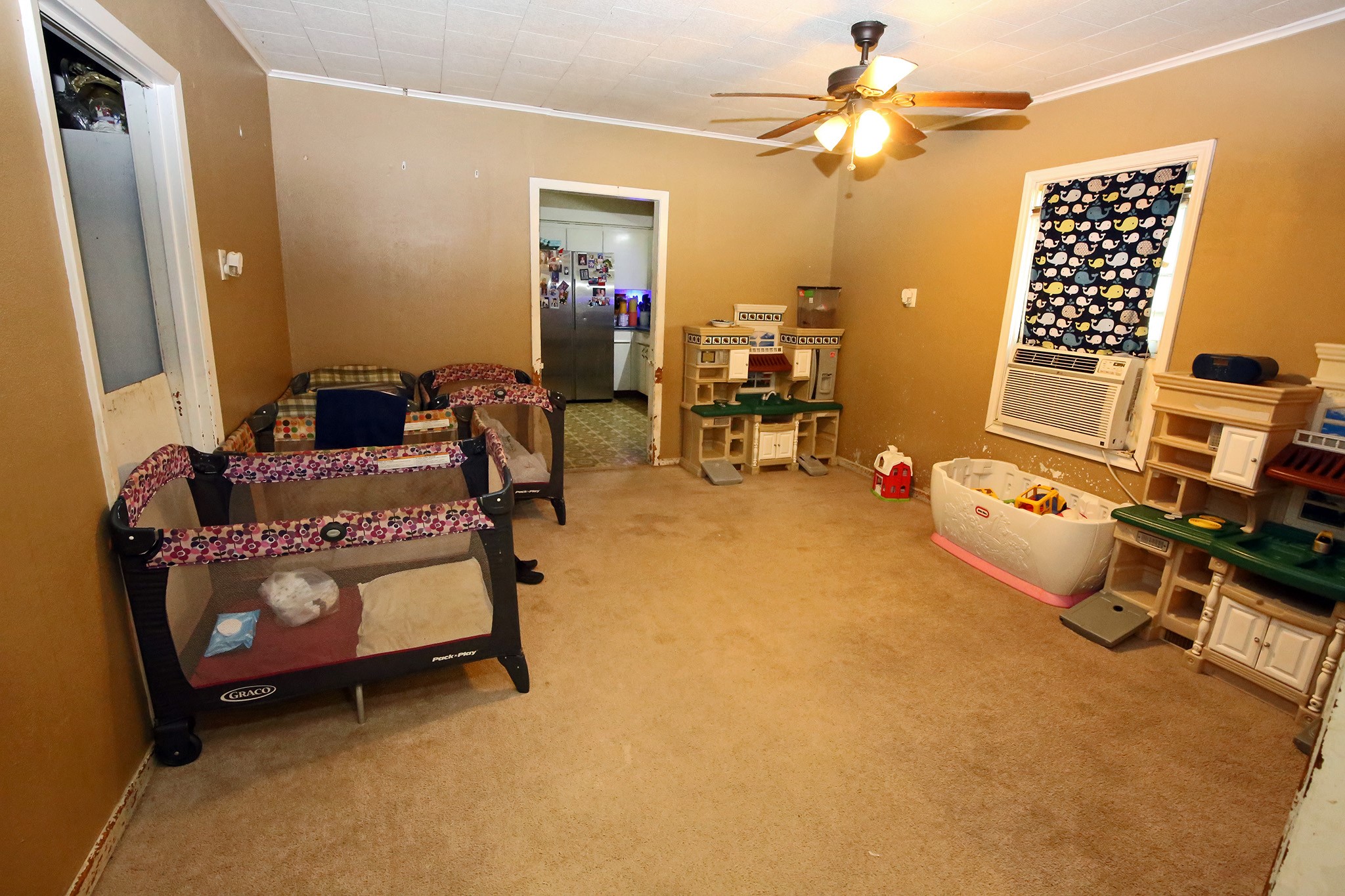 4406 FM 646 Road Santa Fe, TX 77510 - Photo 6 of 26 This could be the formal dining room right off from the kitchen. Now it is being used as a playroom.