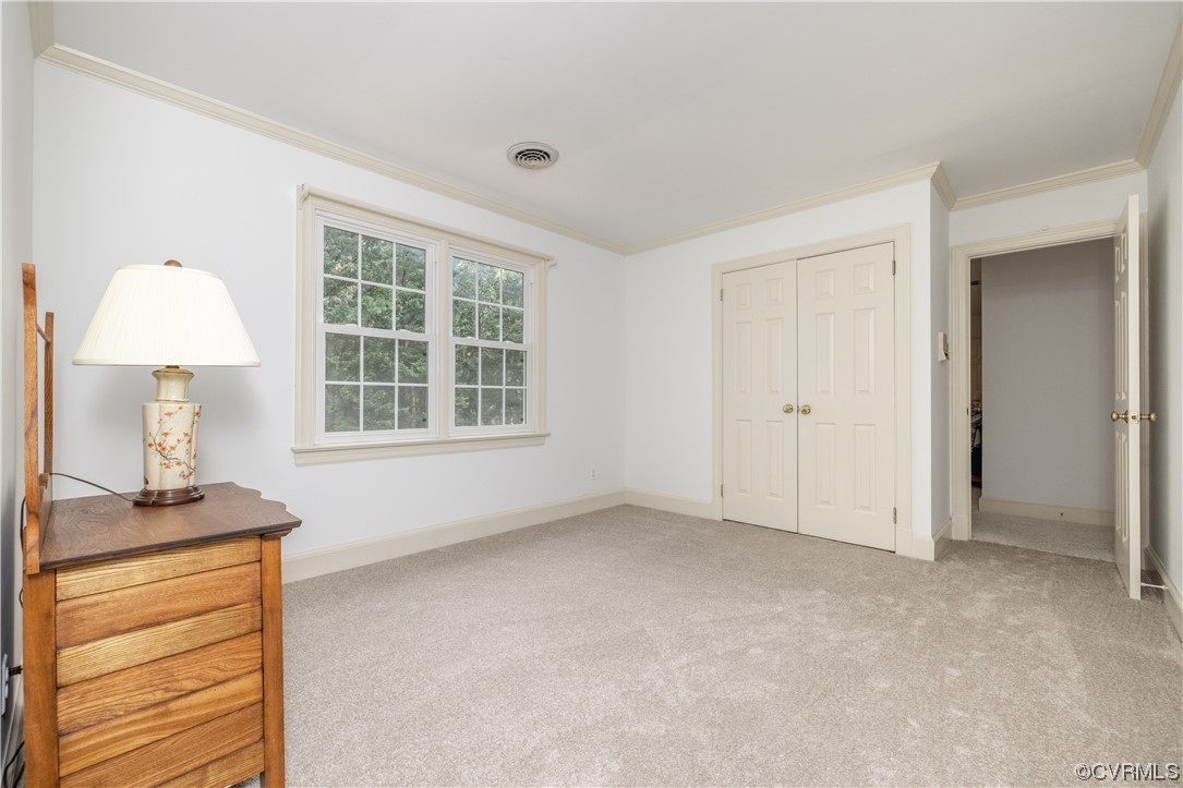 13901 Chepstow Road Midlothian, VA 23113 - Photo 31 of 43 an empty room with a window and a dresser