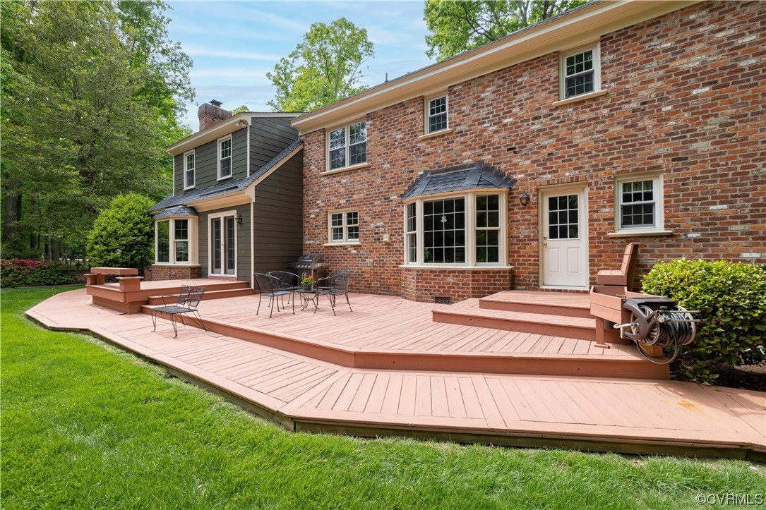 13901 Chepstow Road Midlothian, VA 23113 - Photo 5 of 43 a view of a house with a yard patio and swimming pool
