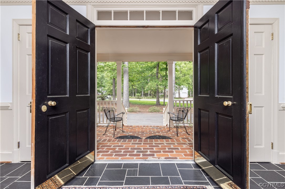 13901 Chepstow Road Midlothian, VA 23113 - Photo 6 of 43 a view of a balcony with wooden floor and door