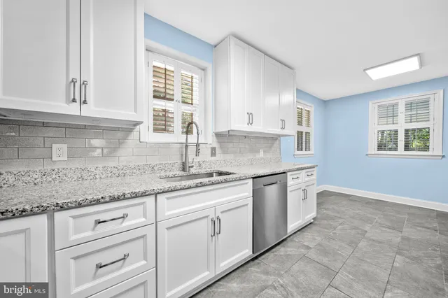 a living room with furniture or wooden floor and a window