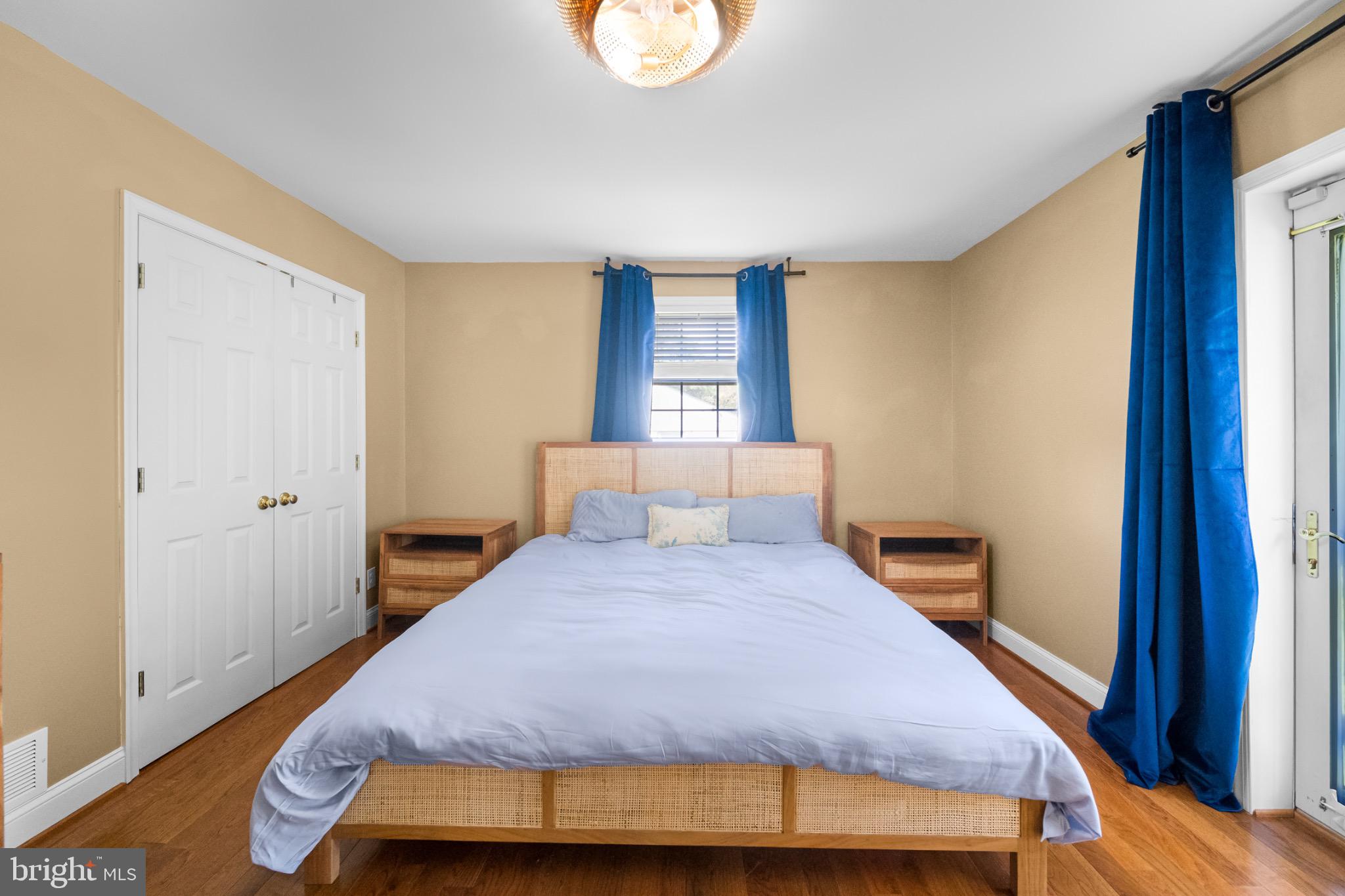 16508 Rolling Tree Road Accokeek, MD 20607 - Photo 21 of 62 a bedroom with a bed and a window