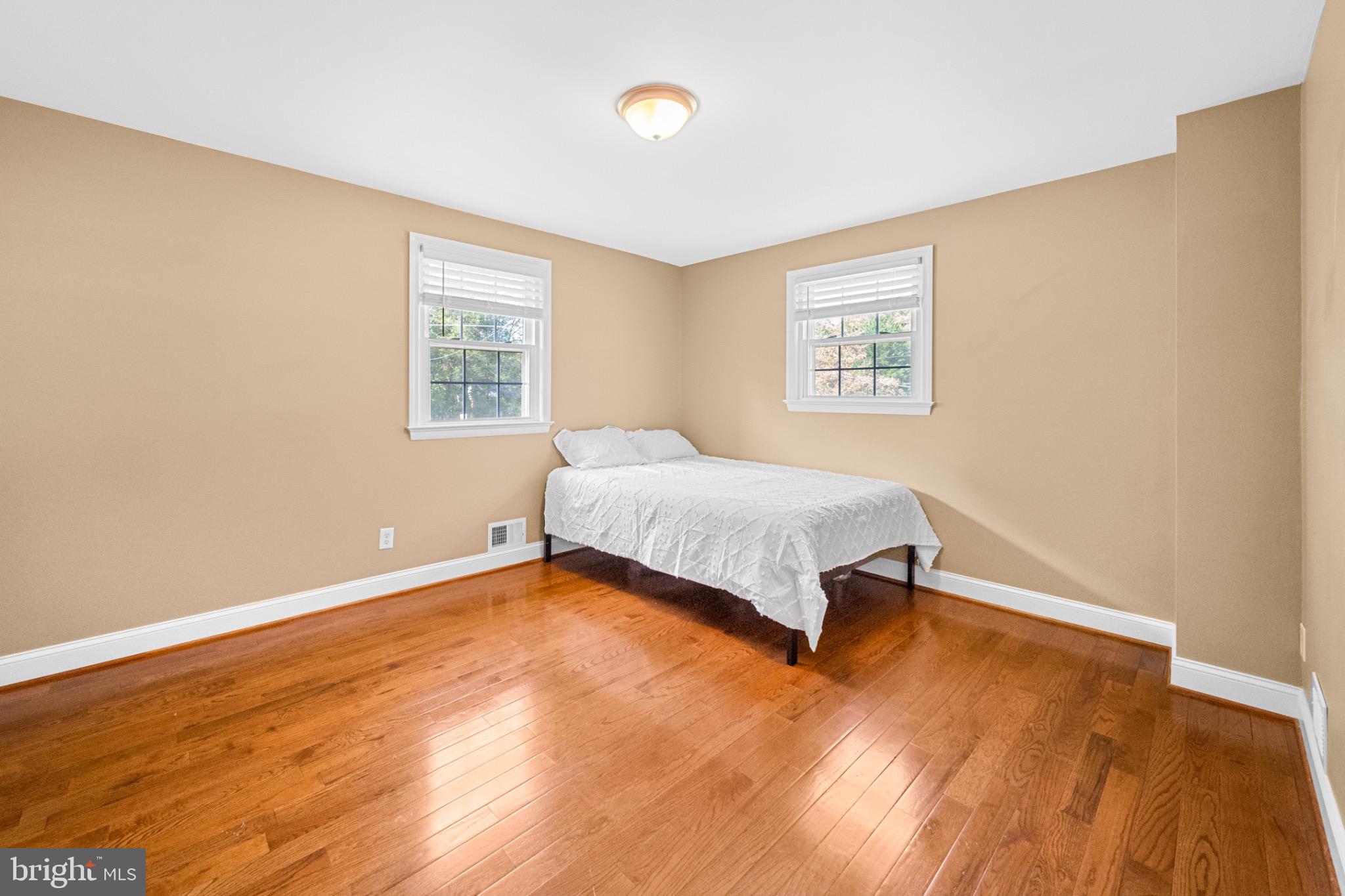 16508 Rolling Tree Road Accokeek, MD 20607 - Photo 26 of 62 a bedroom with a bed and a window