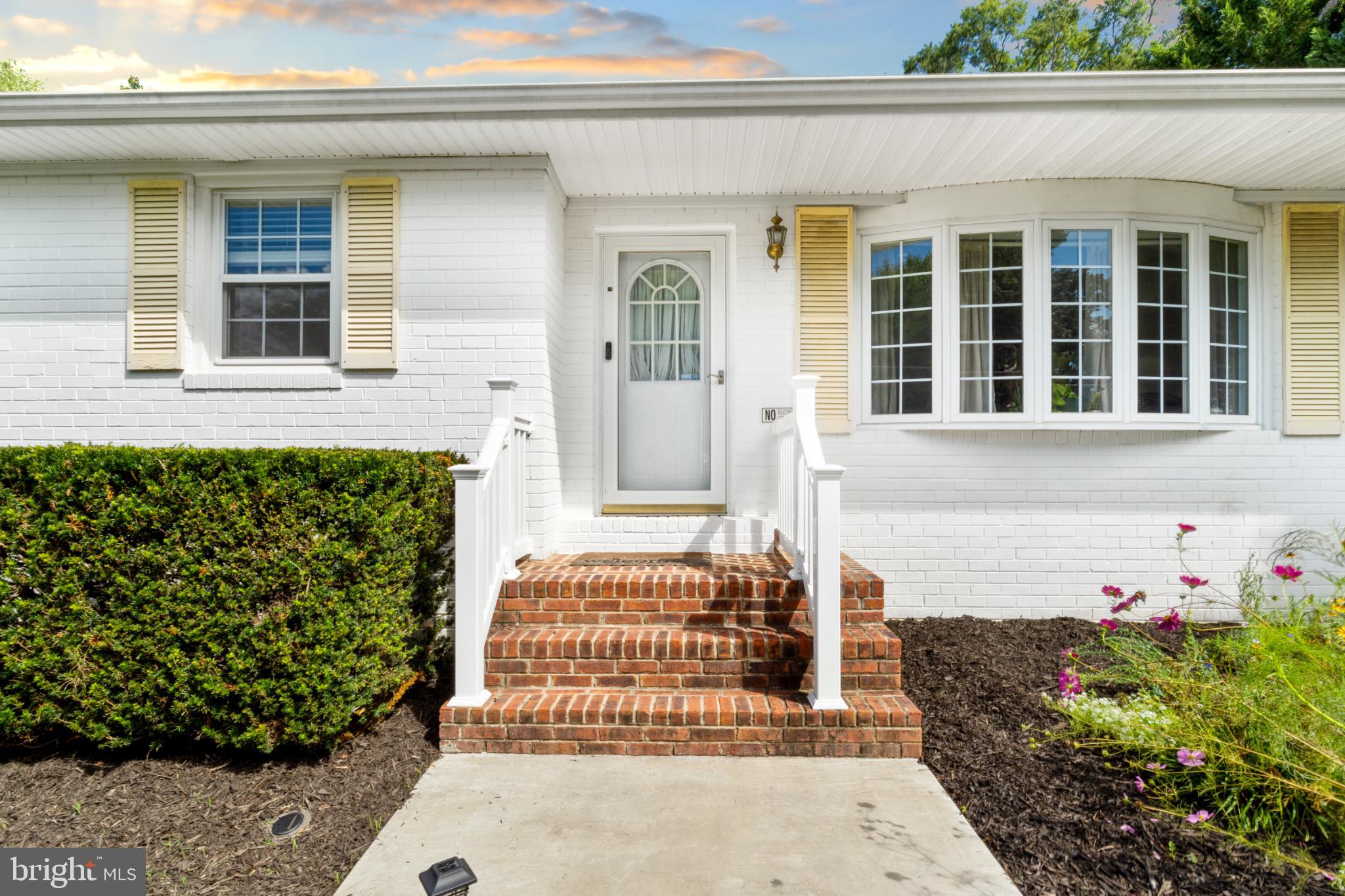 16508 Rolling Tree Road Accokeek, MD 20607 - Photo 3 of 62 Charming entrance with lush greenery.