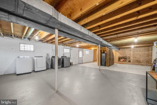 a view of a living room barbeque oven and trees