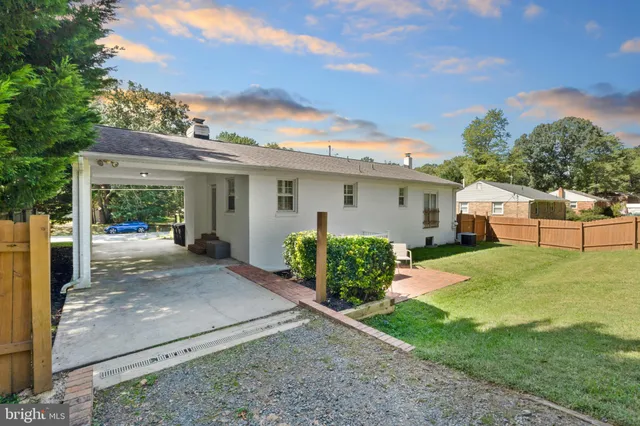 a view of a backyard with a house