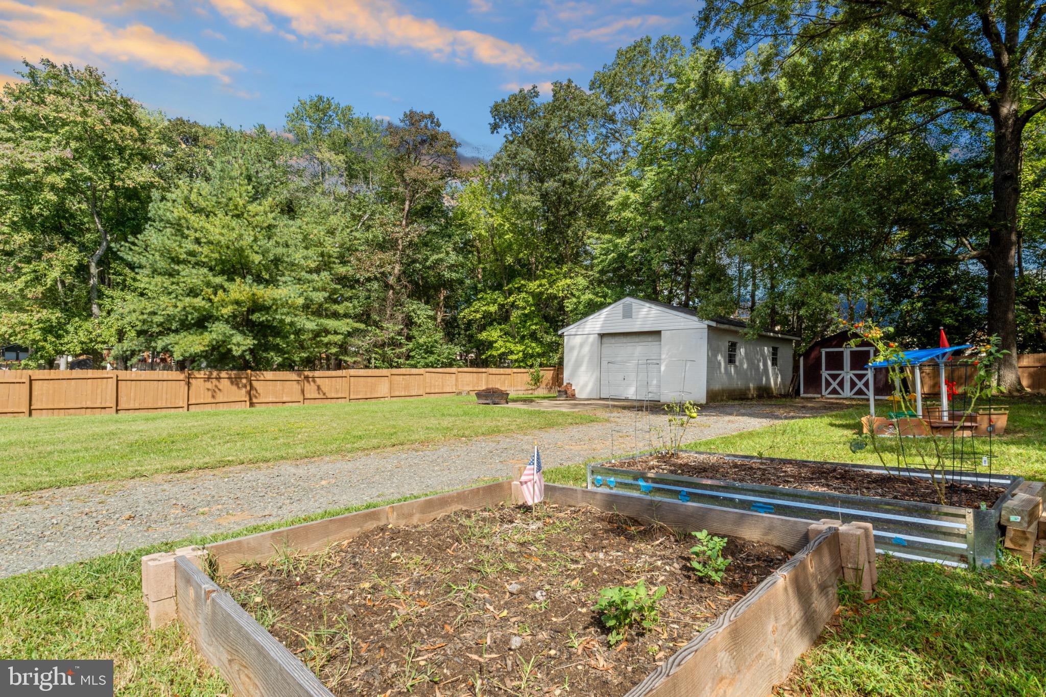 16508 Rolling Tree Road Accokeek, MD 20607 - Photo 46 of 62 a view of a backyard with a house