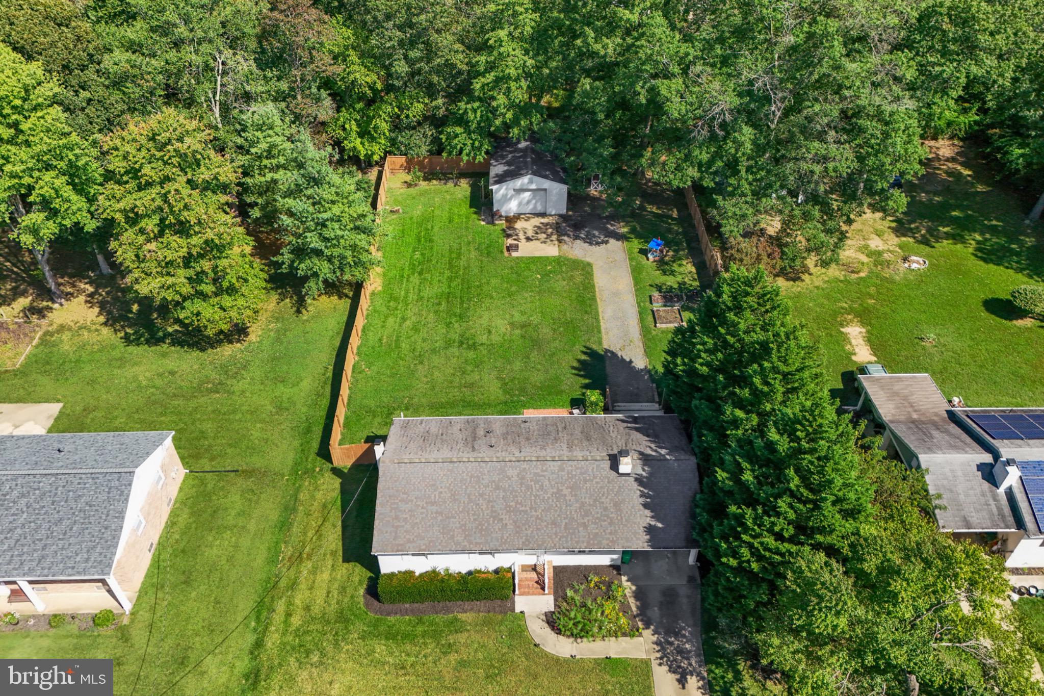 16508 Rolling Tree Road Accokeek, MD 20607 - Photo 59 of 62 an aerial view of a house with a garden