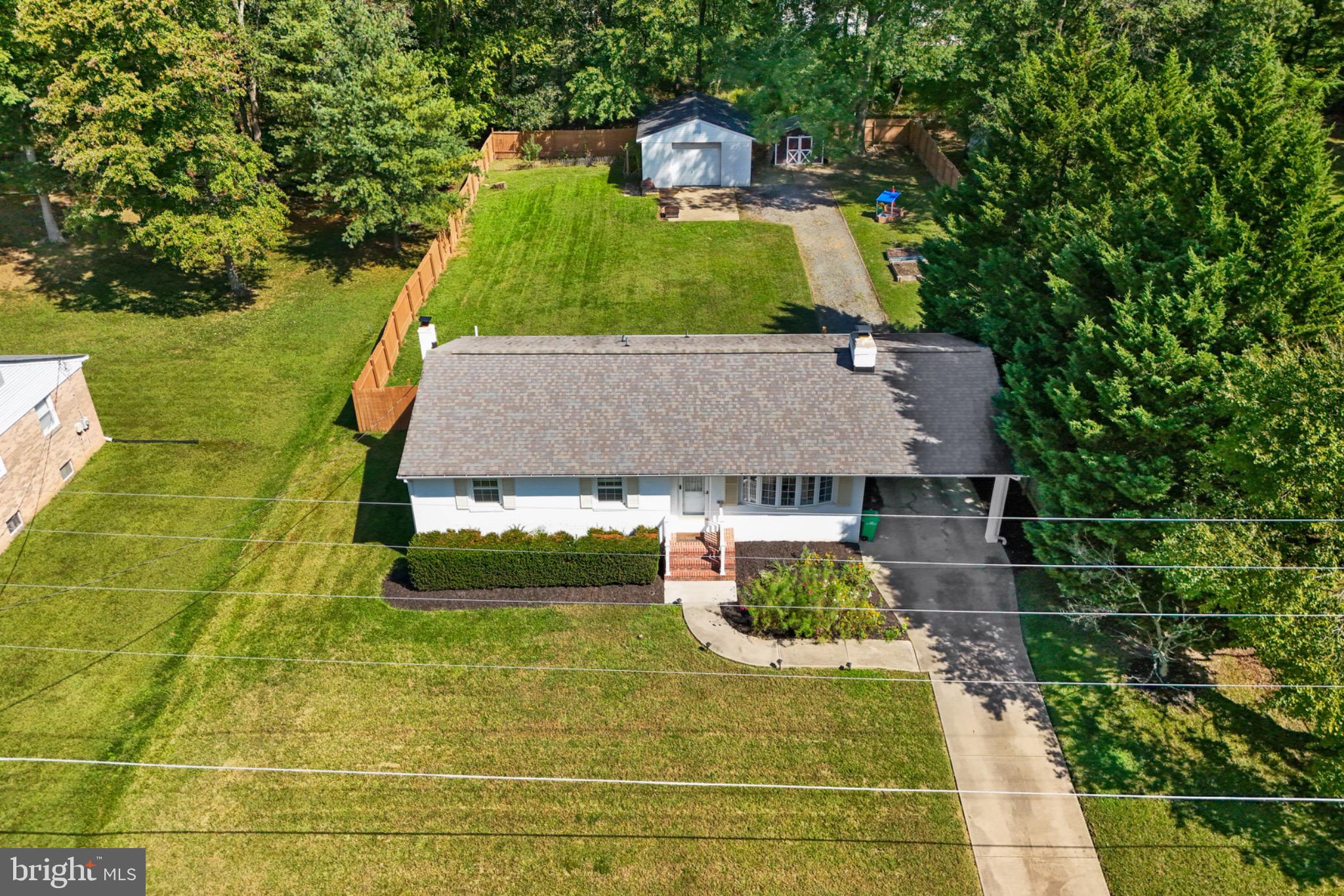 16508 Rolling Tree Road Accokeek, MD 20607 - Photo 60 of 62 Charming home nestled in lush greenery.