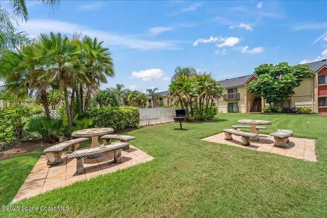 a garden view with a seating space