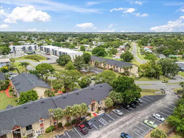 a view of a city with an ocean