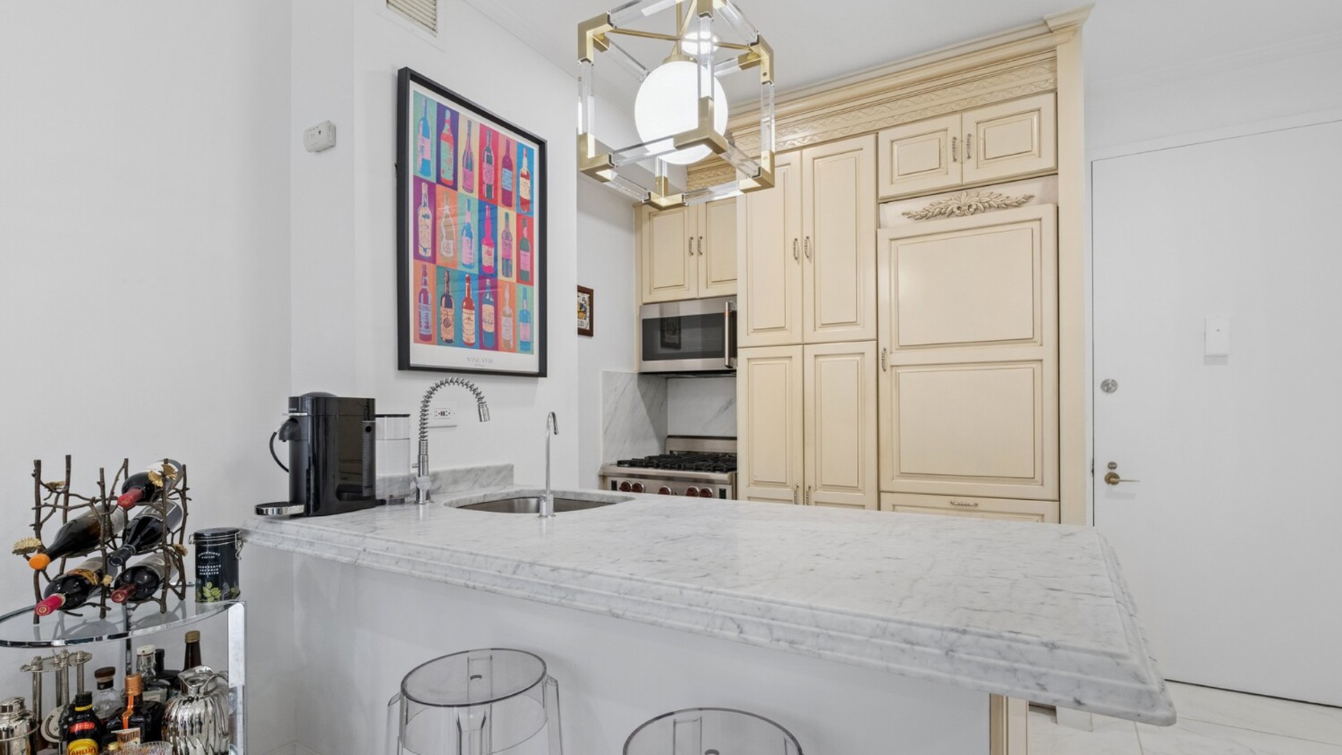 530 East 76th Street, Unit 6J Manhattan, NY 10021 - Photo 3 of 12 a bathroom with a sink vanity and a mirror