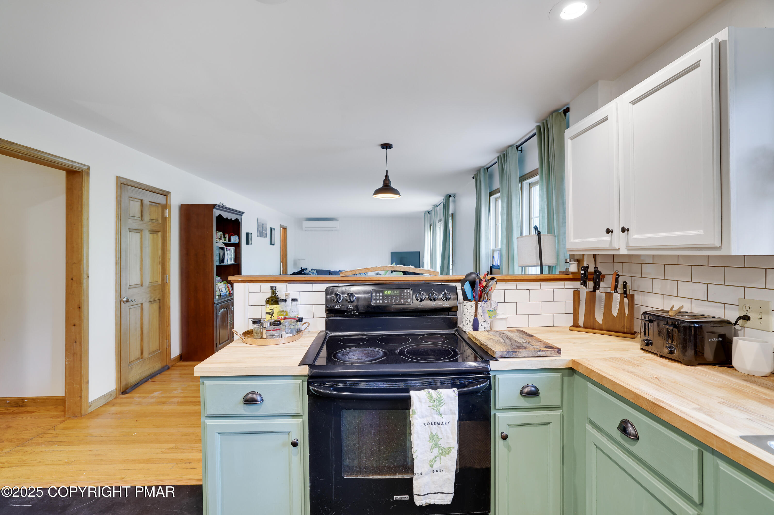 113 Hemlock Road Tannersville, PA 18372 - Photo 12 of 68 a kitchen with a stove and cabinets
