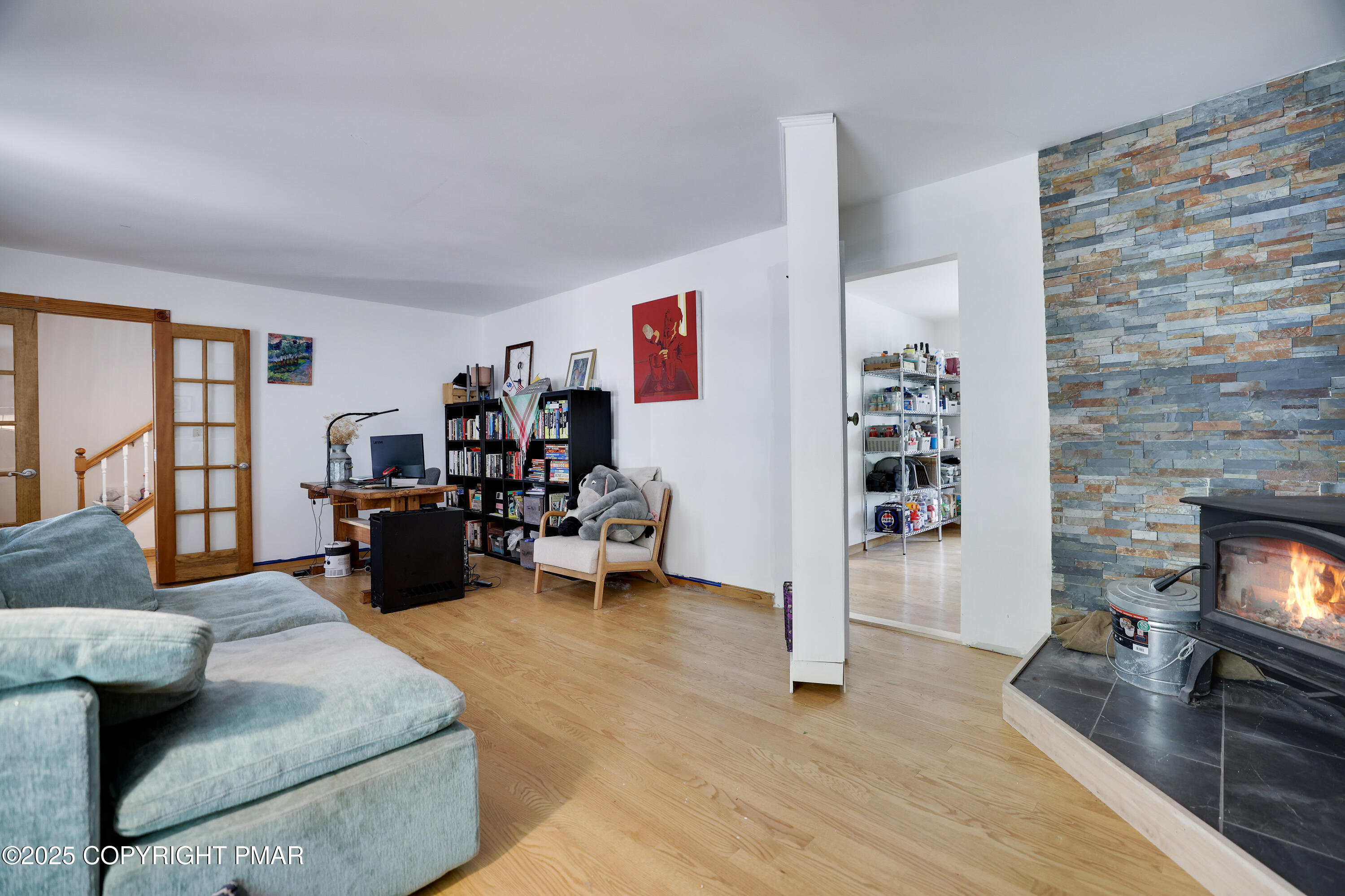113 Hemlock Road Tannersville, PA 18372 - Photo 15 of 68 a living room with furniture and a flat screen tv