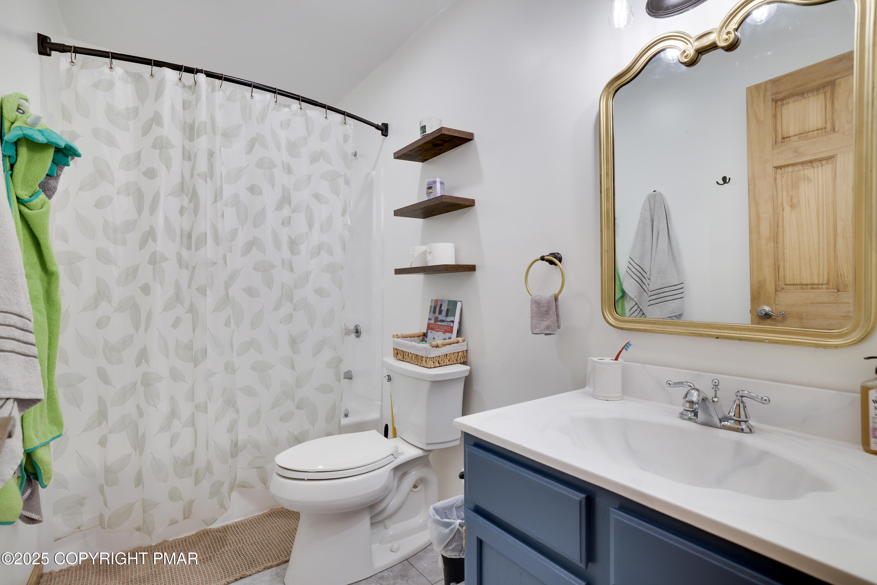 113 Hemlock Road Tannersville, PA 18372 - Photo 32 of 68 a bathroom with a sink vanity mirror and toilet