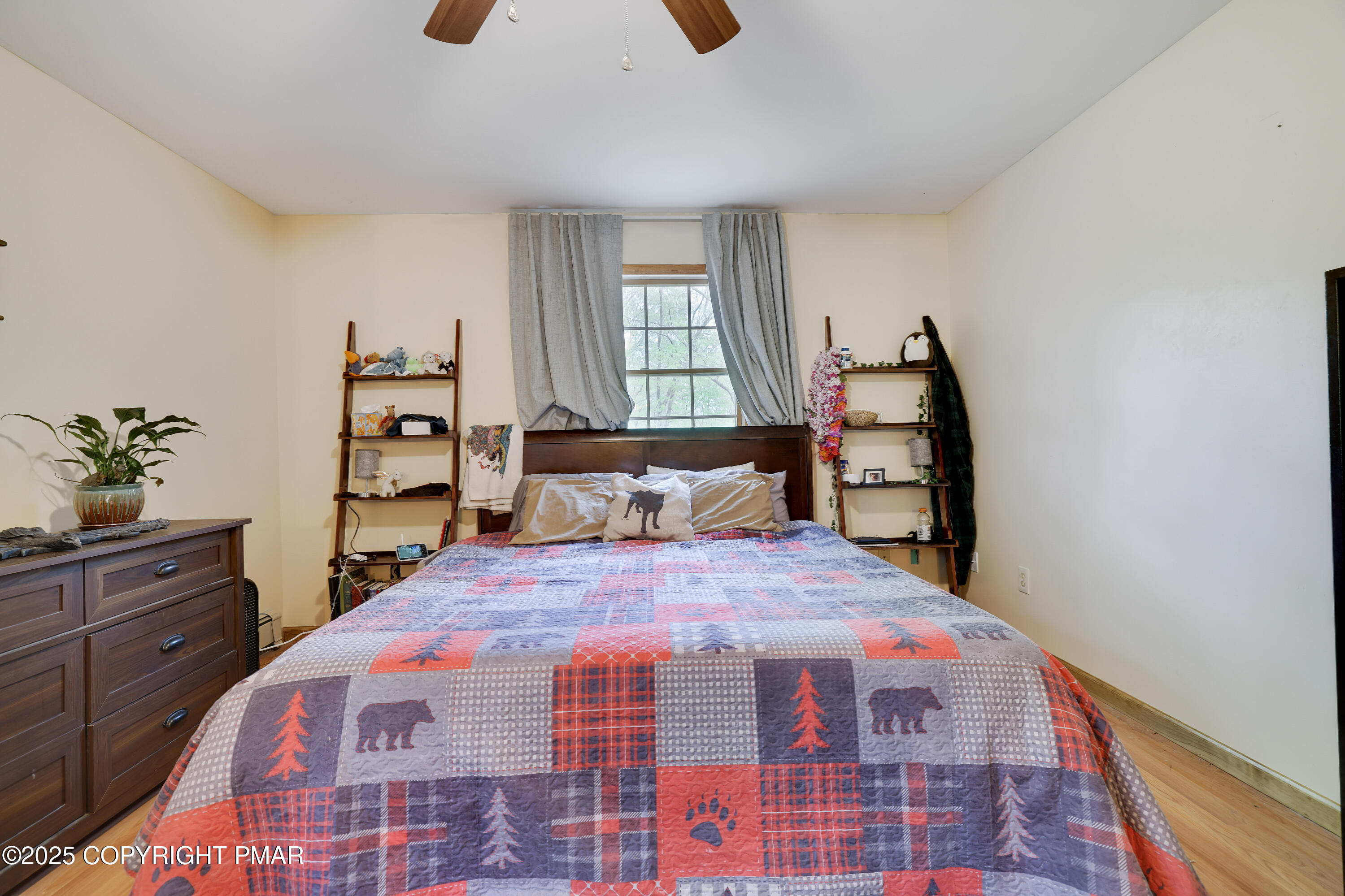 113 Hemlock Road Tannersville, PA 18372 - Photo 39 of 68 a bedroom with a bed and a window