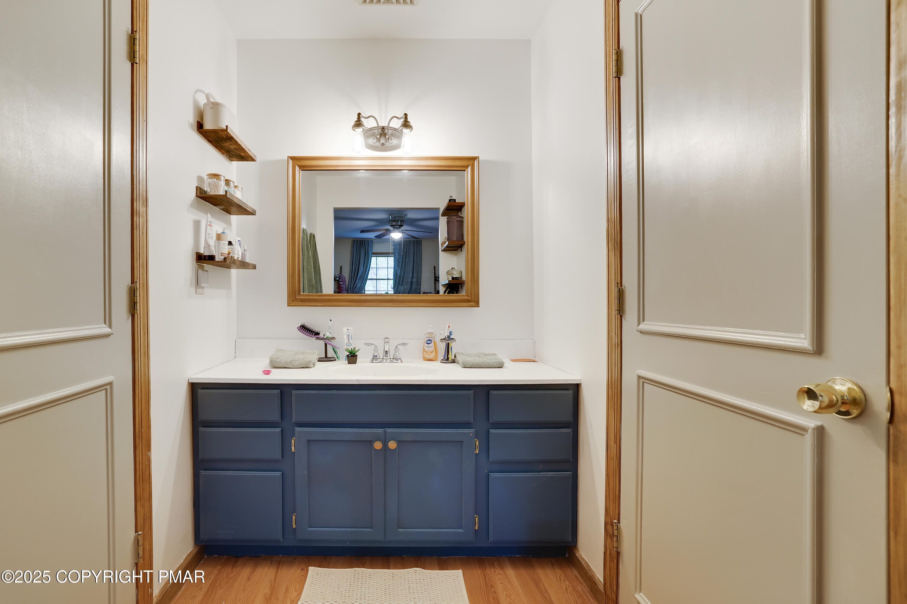 113 Hemlock Road Tannersville, PA 18372 - Photo 40 of 68 a bathroom with a sink and a mirror