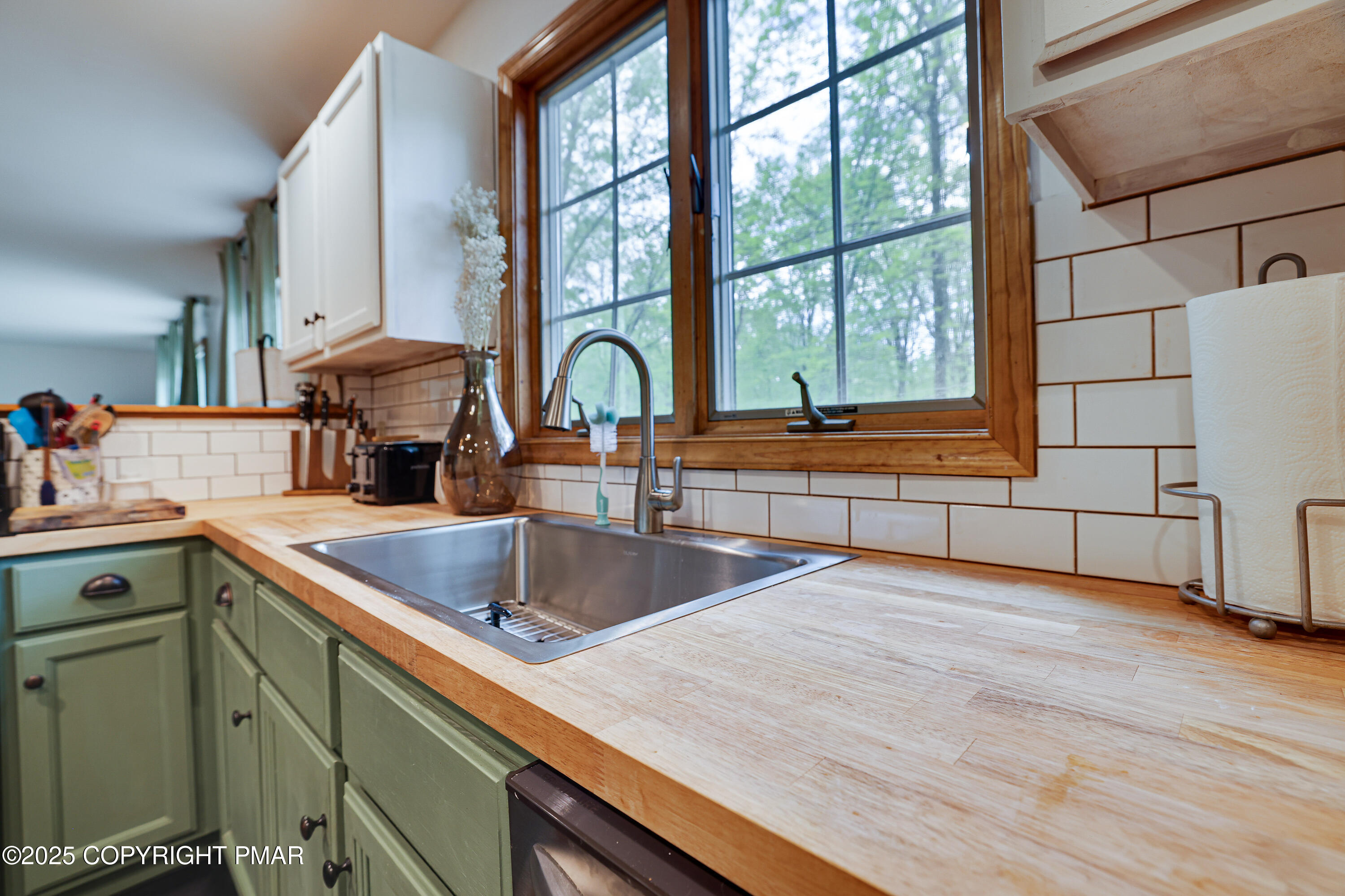 113 Hemlock Road Tannersville, PA 18372 - Photo 10 of 68 a kitchen with stainless steel appliances granite countertop a sink and a wooden floors