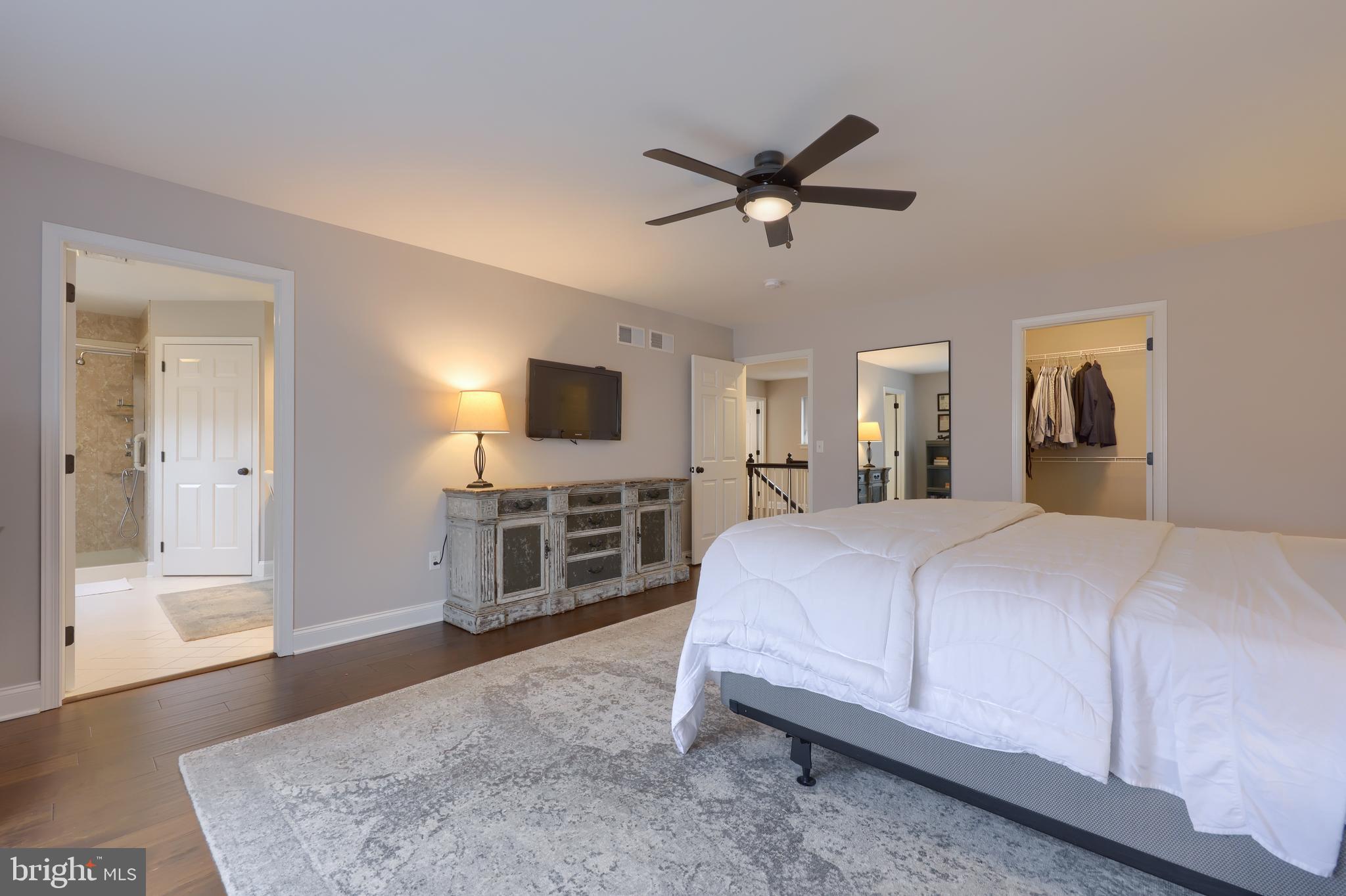 1081 Stillwood Circle Lititz, PA 17543 - Photo 16 of 36 a spacious bedroom with a bed and a flat screen television