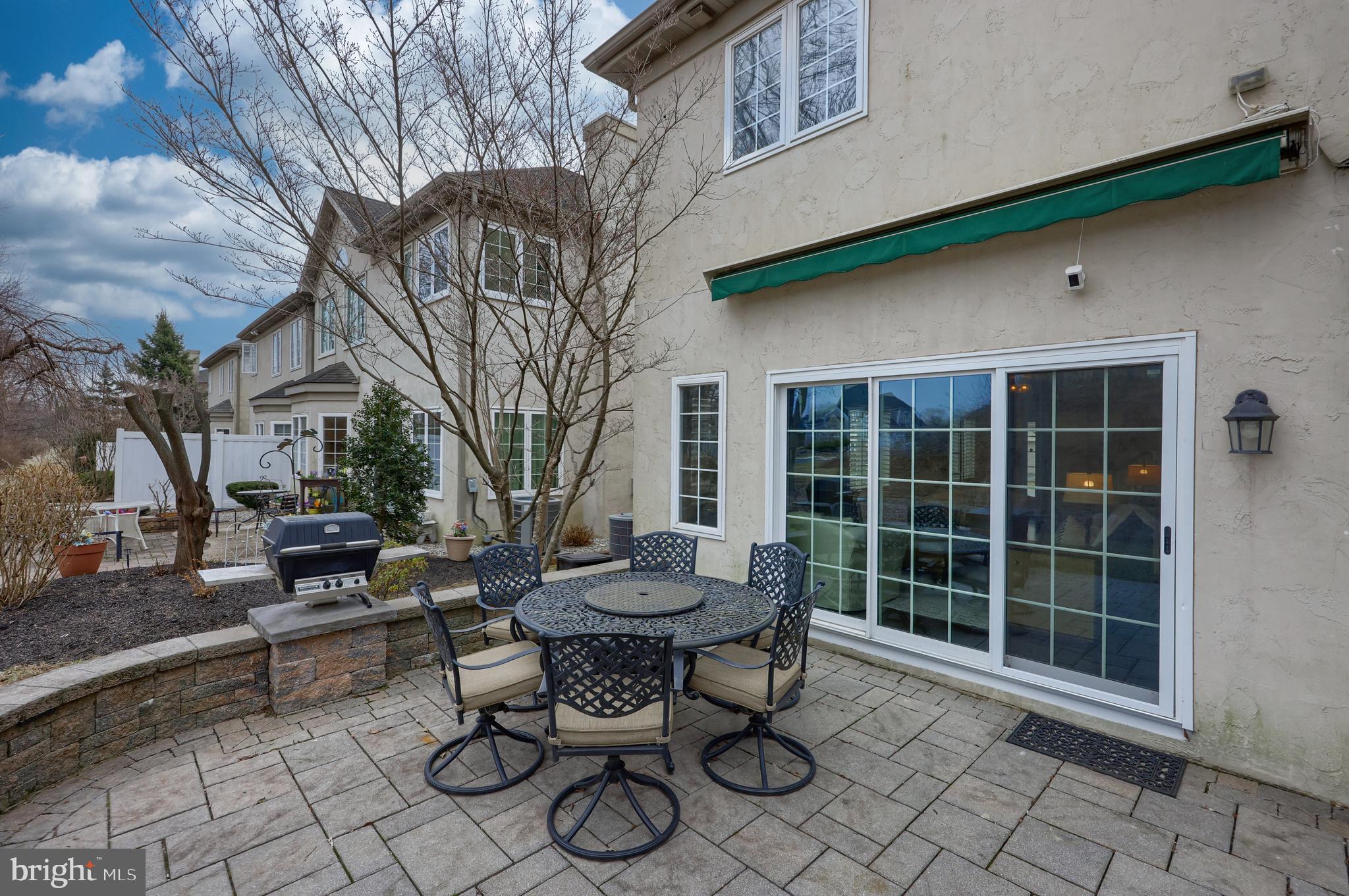 1081 Stillwood Circle Lititz, PA 17543 - Photo 28 of 36 a view of a patio with table and chairs and potted plants