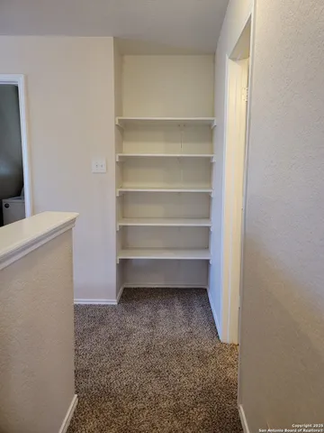 a view of room with empty racks