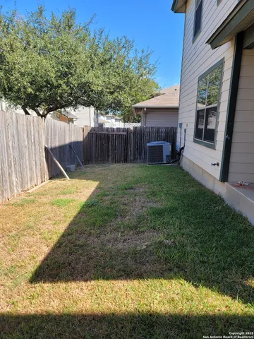 a view of back yard of the house
