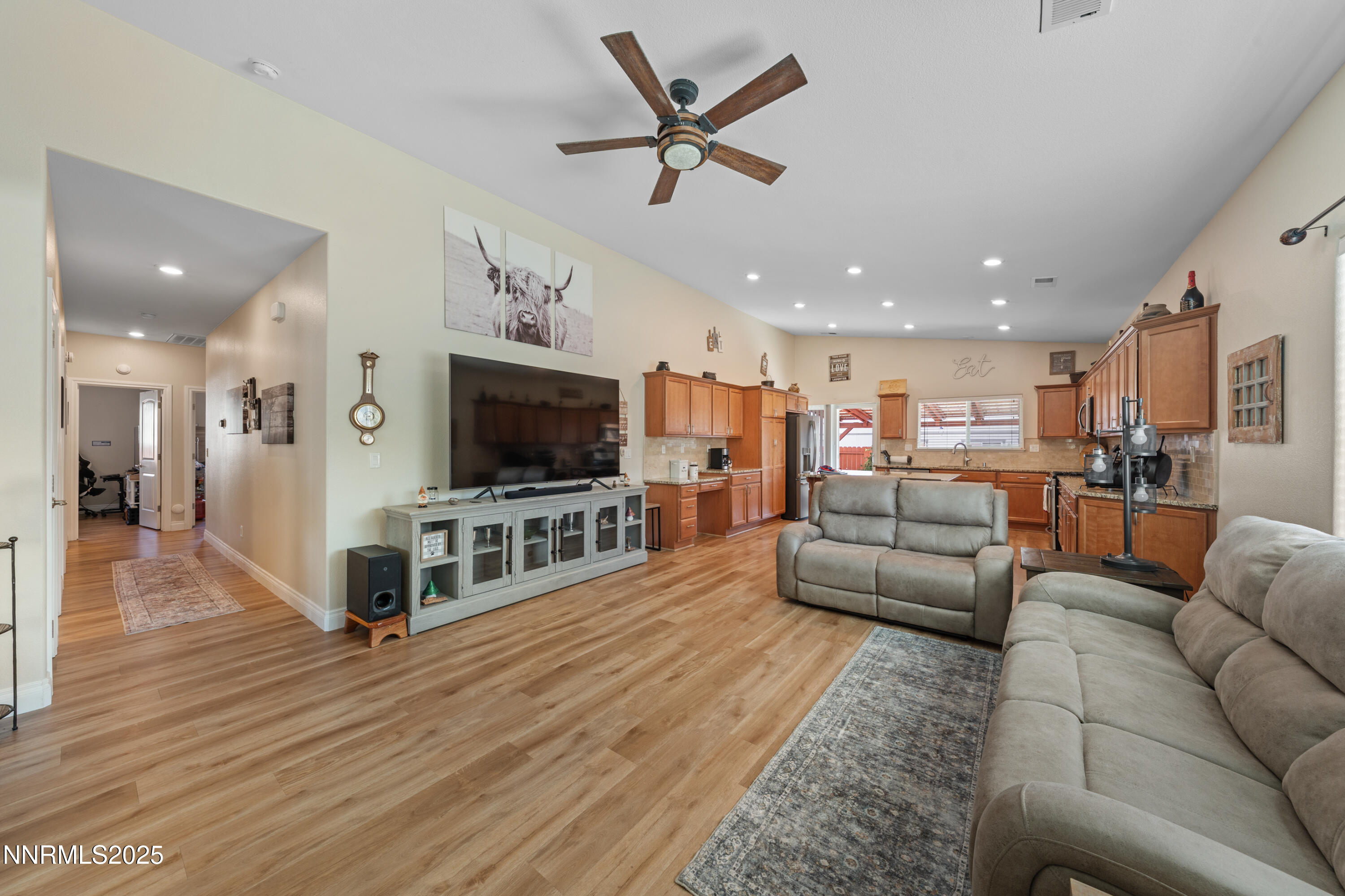 18520 Silverbell Court Reno, NV 89508 - Photo 13 of 60 a living room with furniture and a flat screen tv