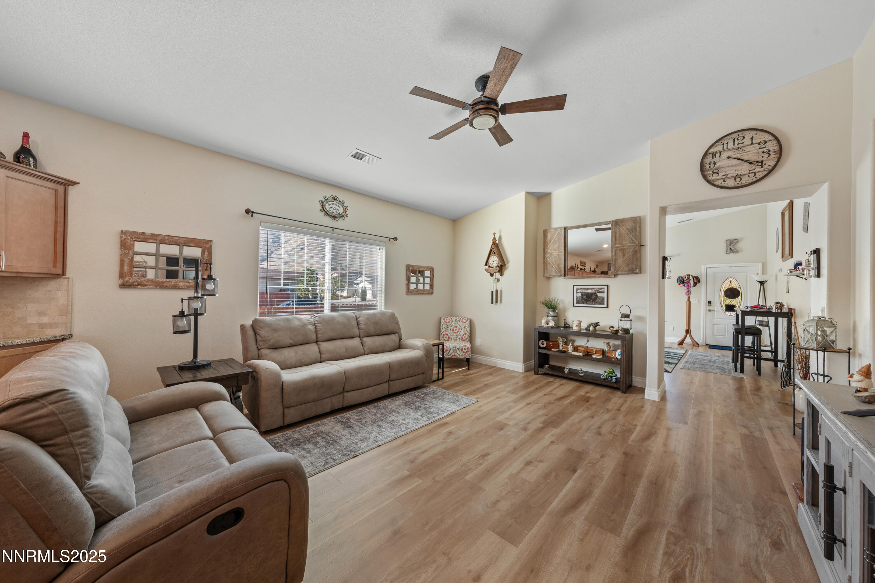 18520 Silverbell Court Reno, NV 89508 - Photo 24 of 60 a living room with furniture and a large window