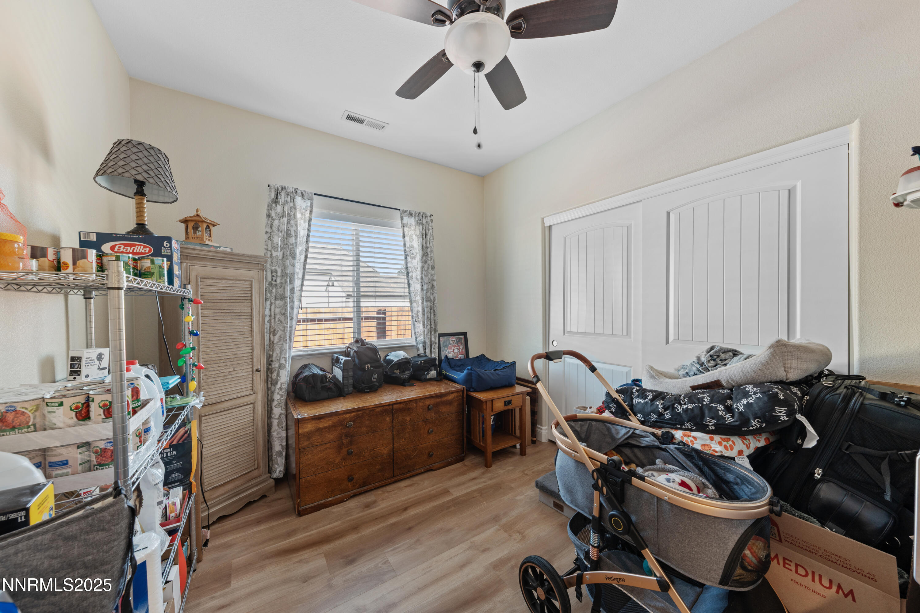 18520 Silverbell Court Reno, NV 89508 - Photo 32 of 60 a living room with furniture and a window