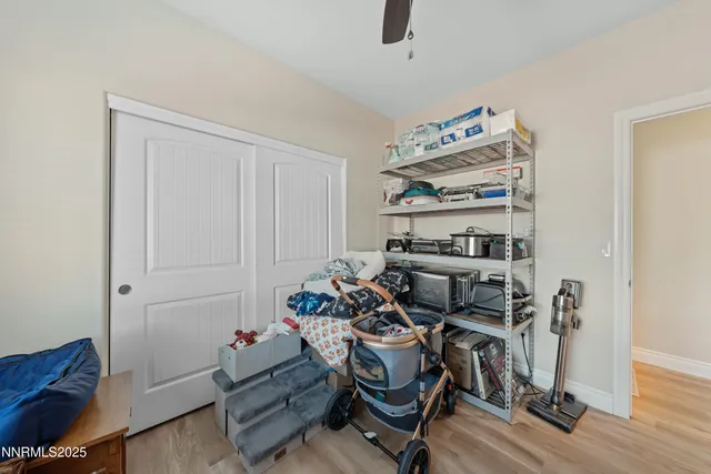 a bed room with furniture and a window