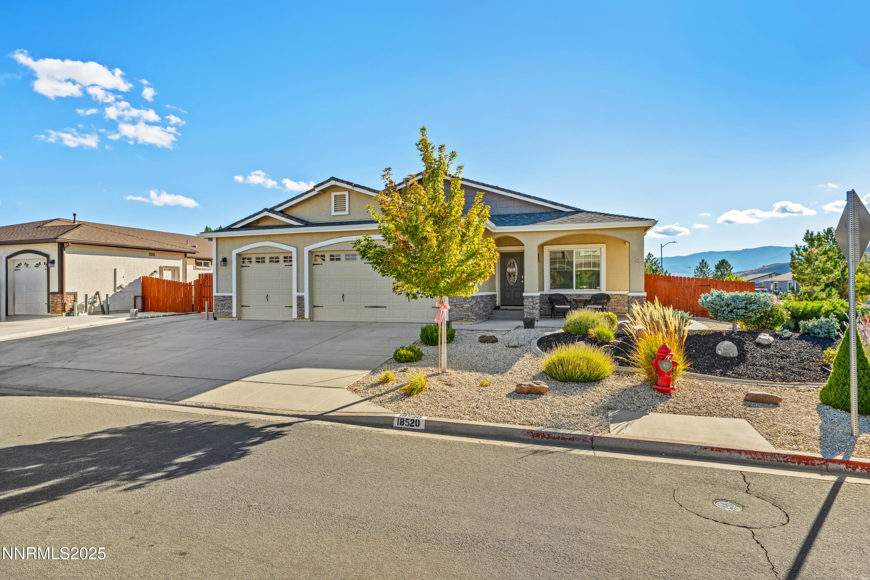 18520 Silverbell Court Reno, NV 89508 - Photo 4 of 60 a front view of house with yard outdoor seating and entertaining space
